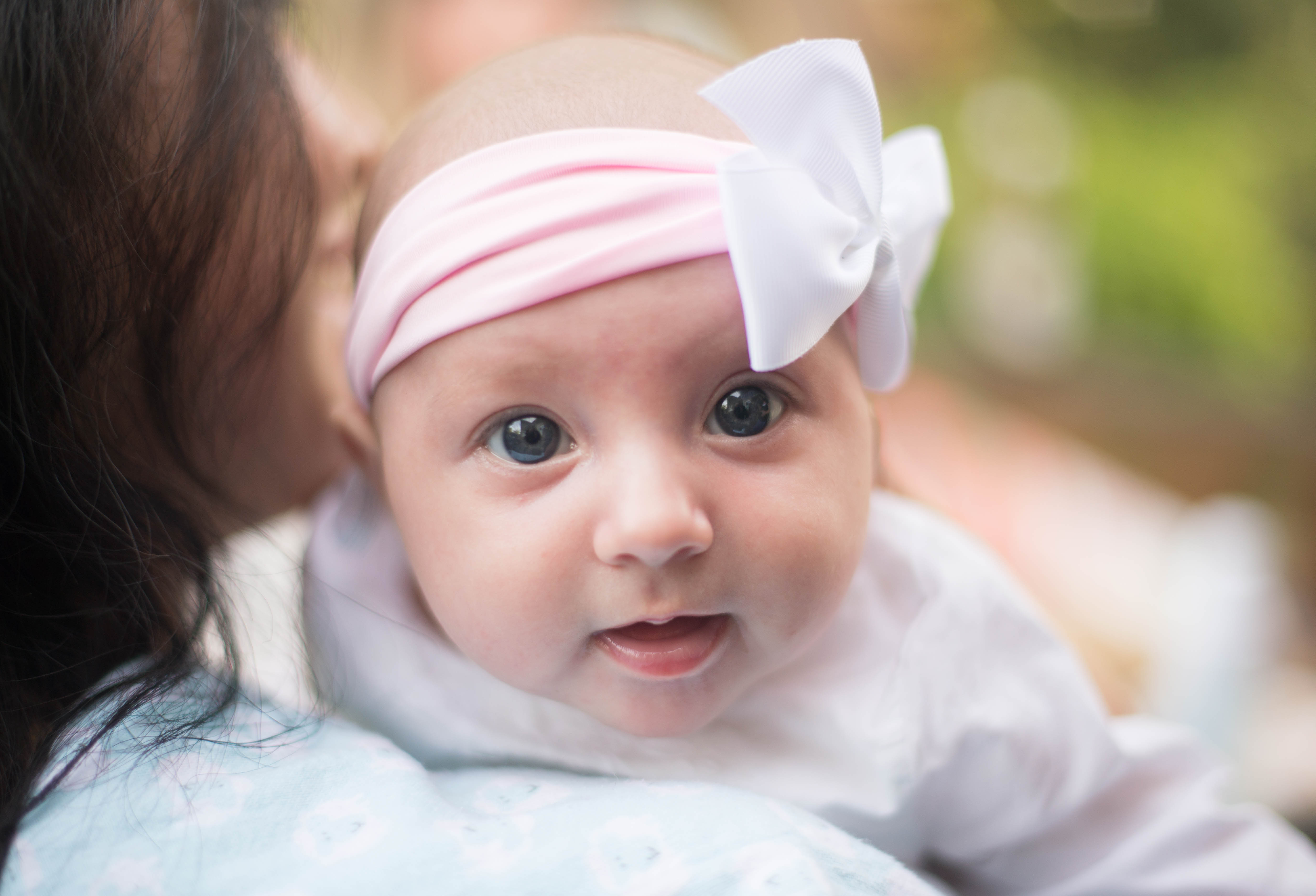 Baby on mother's shoulder